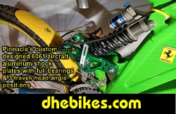 Custom made 6061 aircraft aluminum rear suspension linkage plates with full set of bearings and multiple head angle and travel adjustable positions with quick release shock bolt.