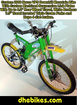 Downhill Dave's custom 2000 Norco VPS Downhill Mountain Bike with White Brothers inverteed fork and titanium bar as well as a long travel Fox Vanilla rear shock and custom made suspension linkage plates with bearings.