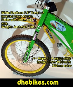 Downhill Dave's custom 2000 Norco VPS Downhill Mountain Bike with White Brothers inverteed fork and titanium bar as well as a long travel Fox Vanilla rear shock and custom made suspension linkage plates with bearings.